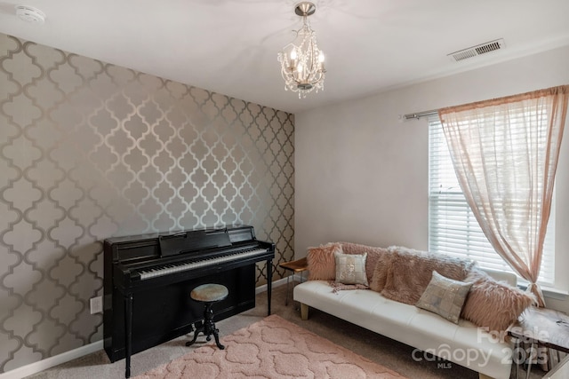 3701 Methodist Church Ln, Waxhaw, NC 28173 - living area featuring wallpapered walls, plenty of natural light, a chandelier, and carpet