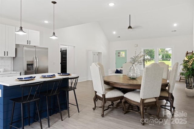 103 Wadesborough Pl, Wadesboro, NC 28170 - dining area with light wood-style flooring, recessed lighting, a ceiling fan, and high vaulted ceiling