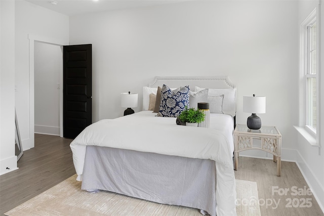 103 Wadesborough Pl, Wadesboro, NC 28170 - bedroom featuring wood finished floors and baseboards