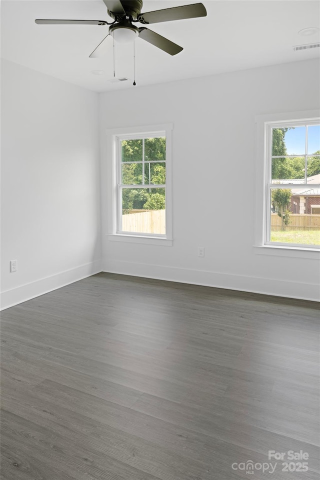 103 Wadesborough Pl, Wadesboro, NC 28170 - unfurnished room featuring plenty of natural light, wood finished floors, and ceiling fan