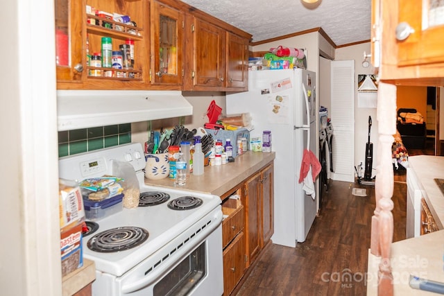401 Webb Church Rd, Ellenboro, NC 28040 - kitchen featuring white appliances, exhaust hood, brown cabinetry, ornamental molding, and dark wood finished floors