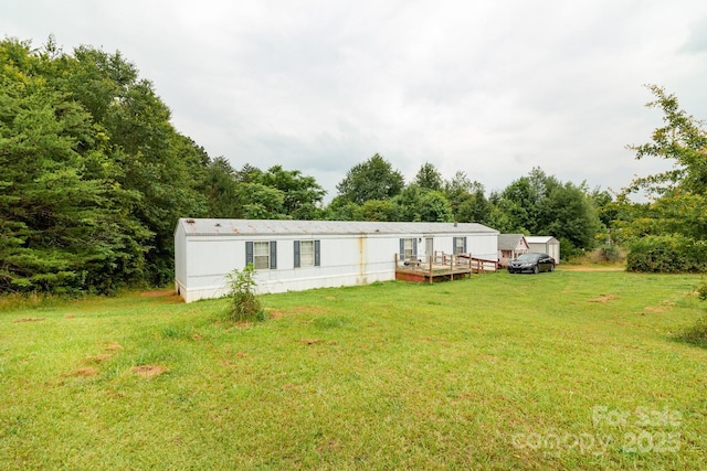 401 Webb Church Rd, Ellenboro, NC 28040 - rear view of house with a lawn and a deck
