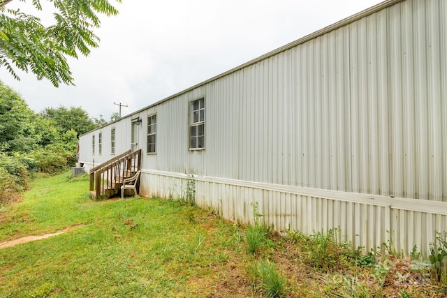 401 Webb Church Rd, Ellenboro, NC 28040 - view of side of property with a lawn and entry steps