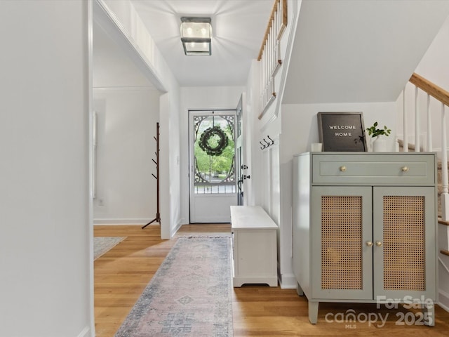 6934 Loretta Pl, Charlotte, NC 28215 - foyer with wood finished floors and baseboards