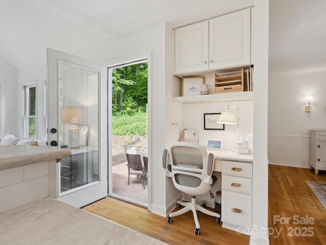 6934 Loretta Pl, Charlotte, NC 28215 - home office featuring wood finished floors