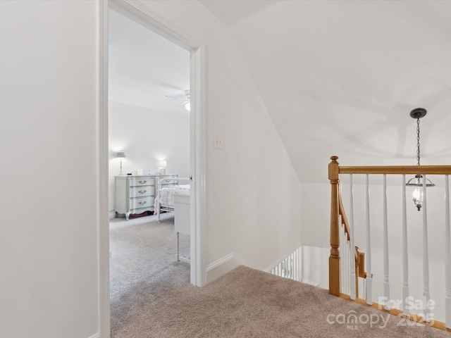 6934 Loretta Pl, Charlotte, NC 28215 - stairs featuring carpet flooring, a ceiling fan, and vaulted ceiling