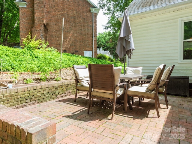 6934 Loretta Pl, Charlotte, NC 28215 - view of patio featuring outdoor dining area