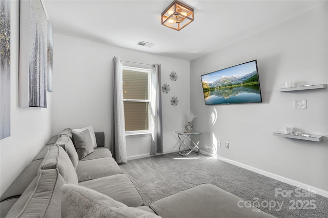 3735 Ernie Dr, Charlotte, NC 28269 - carpeted living area with baseboards