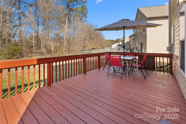 3735 Ernie Dr, Charlotte, NC 28269 - deck featuring outdoor dining space and a fenced backyard