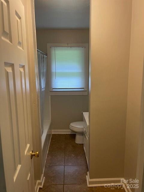 bathroom with vanity, shower / tub combo with curtain, and tile patterned floors