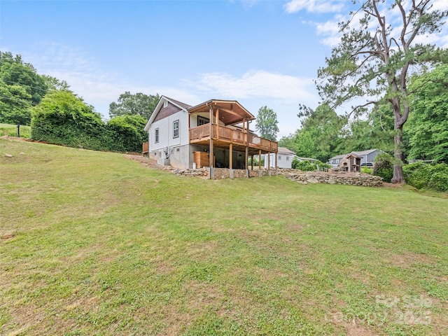 229 Yellow Bird Branch Rd, Sylva, NC 28779 - rear view of house featuring a deck and a yard