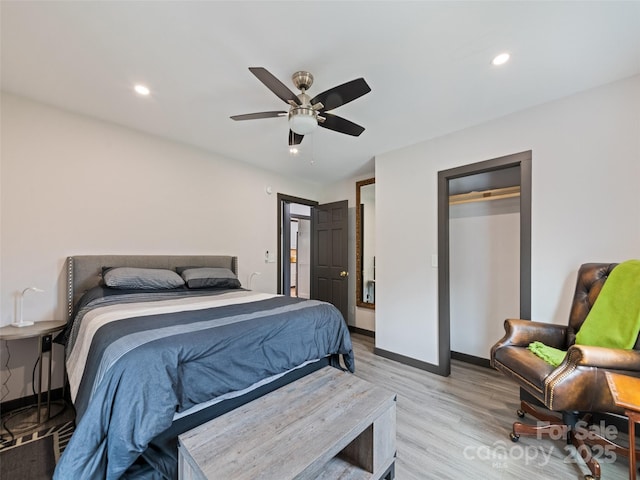 229 Yellow Bird Branch Rd, Sylva, NC 28779 - bedroom featuring light wood-type flooring, ceiling fan, and recessed lighting
