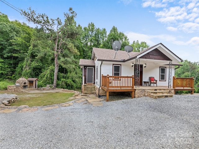 229 Yellow Bird Branch Rd, Sylva, NC 28779 - view of front of house featuring roof with shingles and a wooden deck