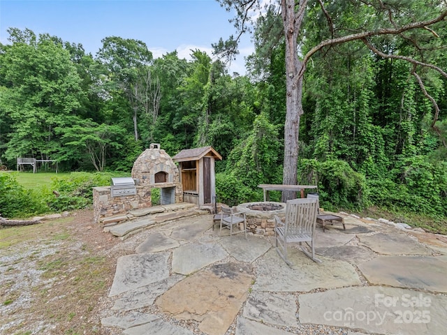 229 Yellow Bird Branch Rd, Sylva, NC 28779 - view of patio with an outdoor fire pit and area for grilling