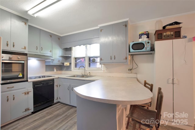 1145 Craigbrow Cir, Chester, SC 29706 - kitchen featuring black appliances, open shelves, a peninsula, crown molding, and light countertops