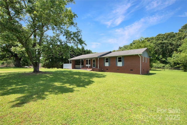 1145 Craigbrow Cir, Chester, SC 29706 - rear view of property with crawl space, a patio, a lawn, and brick siding