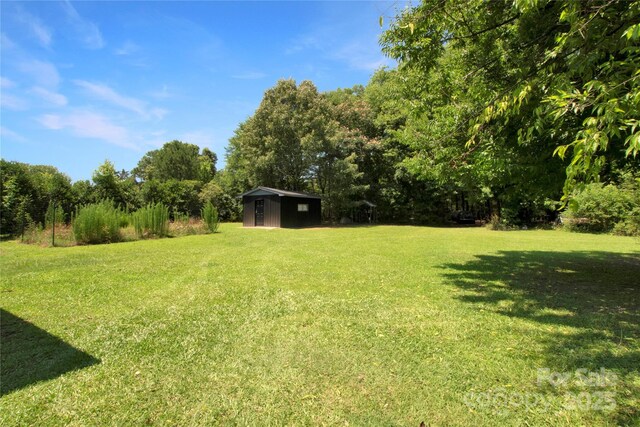 1145 Craigbrow Cir, Chester, SC 29706 - view of green lawn with an outdoor structure