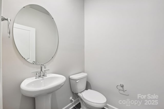 2125 Rolling Hills Ct, Stanley, NC 28164 - half bath with baseboards and toilet
