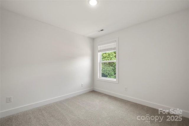 443 Faith Dr SW, Concord, NC 28027 - empty room featuring baseboards and carpet