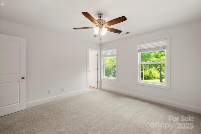 443 Faith Dr SW, Concord, NC 28027 - unfurnished room with light carpet and ceiling fan