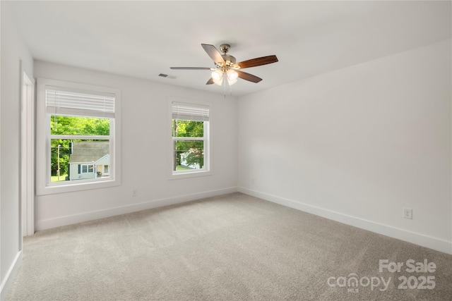 443 Faith Dr SW, Concord, NC 28027 - unfurnished room with a ceiling fan and carpet flooring