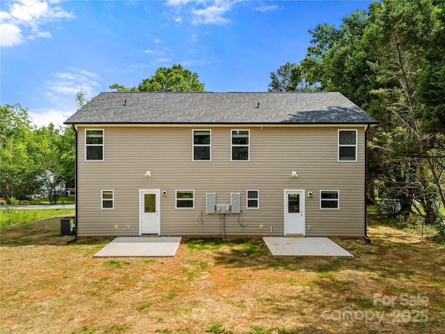 443 Faith Dr SW, Concord, NC 28027 - rear view of property with a patio area and a lawn
