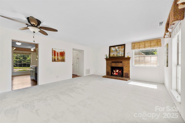 1670 Robins Nest Ct Unit D, Gastonia, NC 28054 - unfurnished living room with ceiling fan, a fireplace, and carpet floors