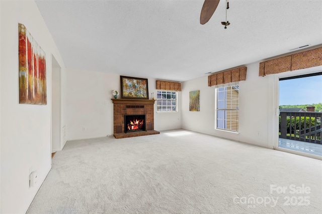 1670 Robins Nest Ct Unit D, Gastonia, NC 28054 - unfurnished living room with carpet flooring, a fireplace, and a ceiling fan