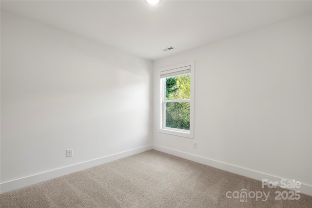 445 Faith Dr SW, Concord, NC 28027 - carpeted empty room with baseboards
