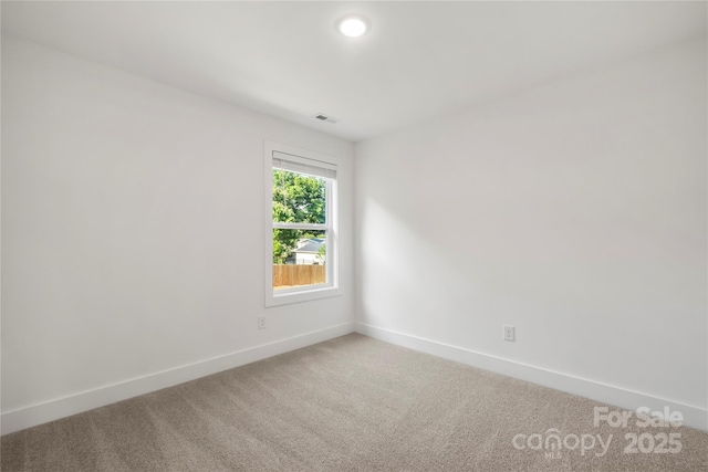 445 Faith Dr SW, Concord, NC 28027 - empty room with carpet and baseboards