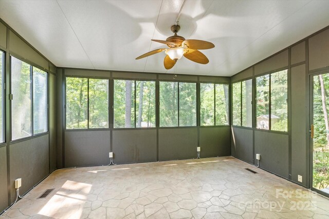 55 Diamond Ridge Ln, Columbus, NC 28722 - unfurnished sunroom featuring ceiling fan