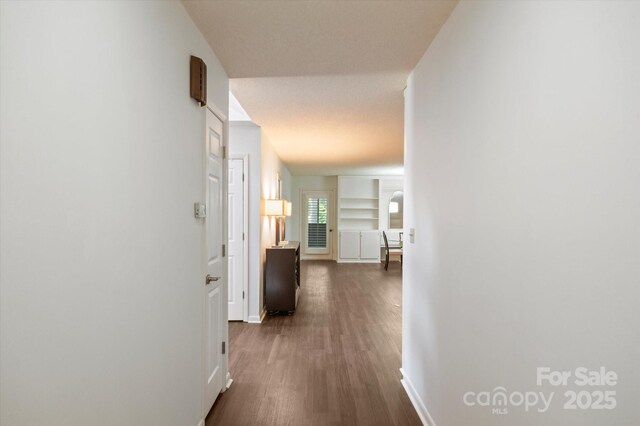 55 Diamond Ridge Ln, Columbus, NC 28722 - corridor featuring dark wood finished floors and baseboards