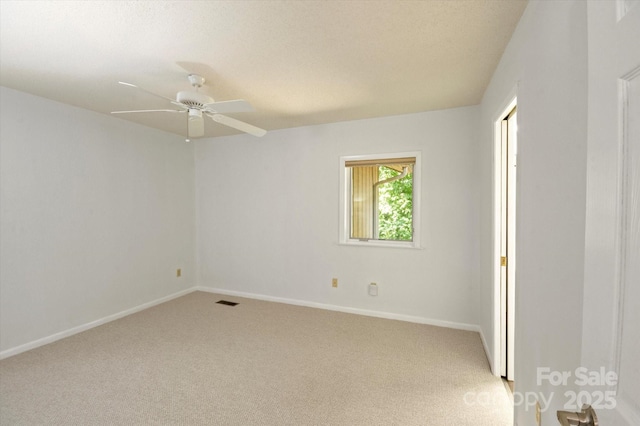 55 Diamond Ridge Ln, Columbus, NC 28722 - spare room featuring light colored carpet and a ceiling fan