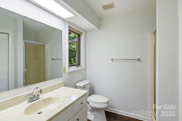 55 Diamond Ridge Ln, Columbus, NC 28722 - bathroom featuring vanity, a shower stall, and wood finished floors