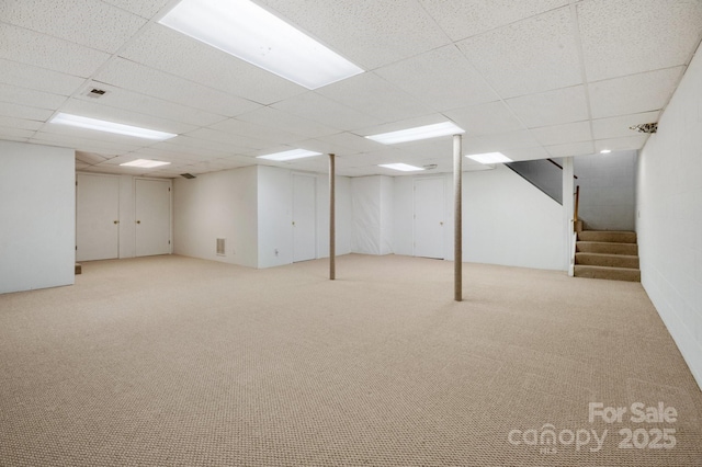 55 Diamond Ridge Ln, Columbus, NC 28722 - finished below grade area with a drop ceiling, stairway, and carpet floors