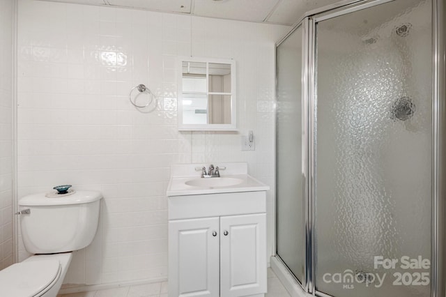 55 Diamond Ridge Ln, Columbus, NC 28722 - bathroom featuring vanity, a stall shower, and tile walls