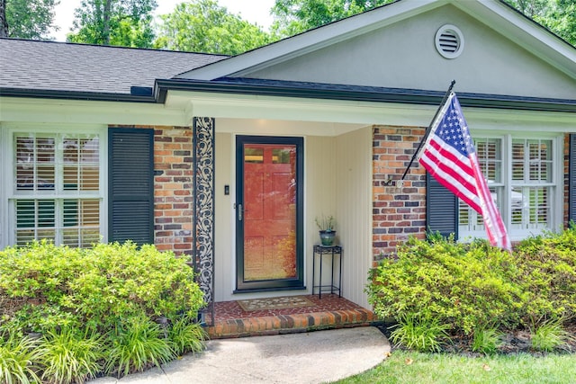 7026 Tabor Ln, Charlotte, NC 28211 - entrance to property with brick siding, a shingled roof, and a porch