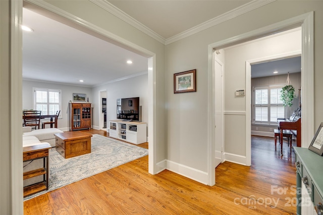 7026 Tabor Ln, Charlotte, NC 28211 - living room featuring light wood-style flooring, ornamental molding, and recessed lighting