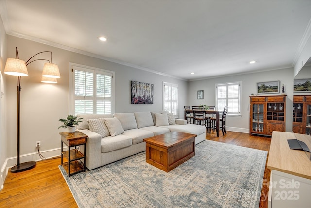 7026 Tabor Ln, Charlotte, NC 28211 - living area featuring ornamental molding, wood finished floors, and recessed lighting