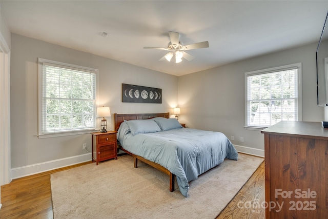 7026 Tabor Ln, Charlotte, NC 28211 - bedroom featuring wood finished floors and a ceiling fan