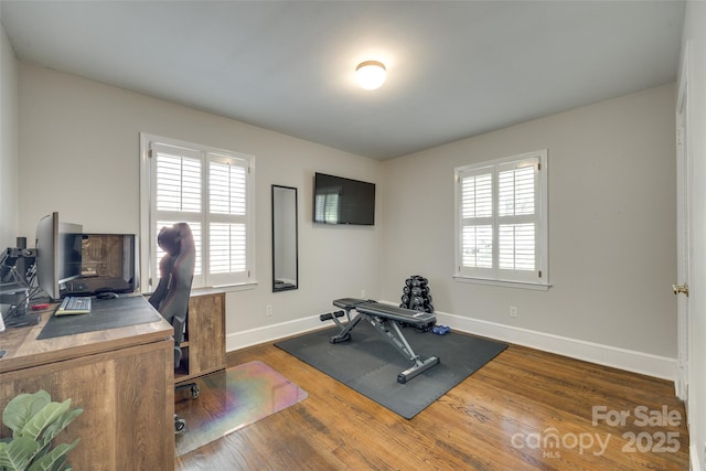 7026 Tabor Ln, Charlotte, NC 28211 - office area featuring plenty of natural light and wood finished floors