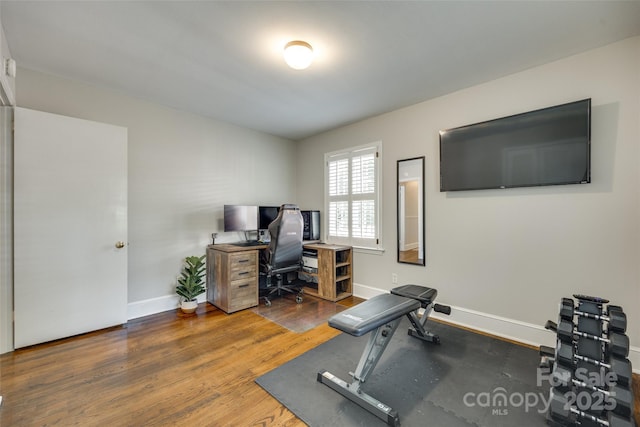 7026 Tabor Ln, Charlotte, NC 28211 - office with baseboards and wood finished floors
