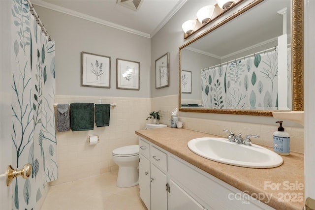 7026 Tabor Ln, Charlotte, NC 28211 - full bathroom featuring vanity, tile walls, a wainscoted wall, crown molding, and tile patterned flooring