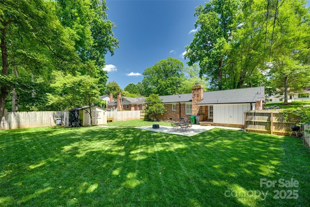 7026 Tabor Ln, Charlotte, NC 28211 - fenced backyard featuring a storage unit and a patio
