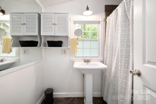 5 Arbutus Rd, Asheville, NC 28805 - full bathroom with baseboards and a shower with curtain