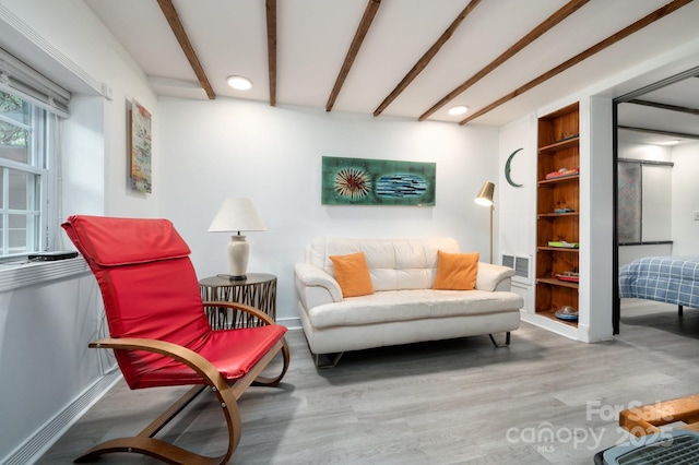 5 Arbutus Rd, Asheville, NC 28805 - sitting room featuring wood finished floors, recessed lighting, and beamed ceiling