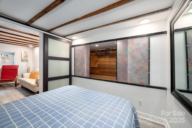 5 Arbutus Rd, Asheville, NC 28805 - bedroom featuring wood finished floors and beam ceiling