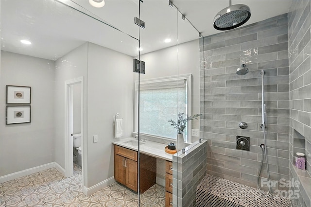7903 Tottenham Ct, Waxhaw, NC 28173 - full bath with a tile shower, tile patterned floors, vanity, and recessed lighting
