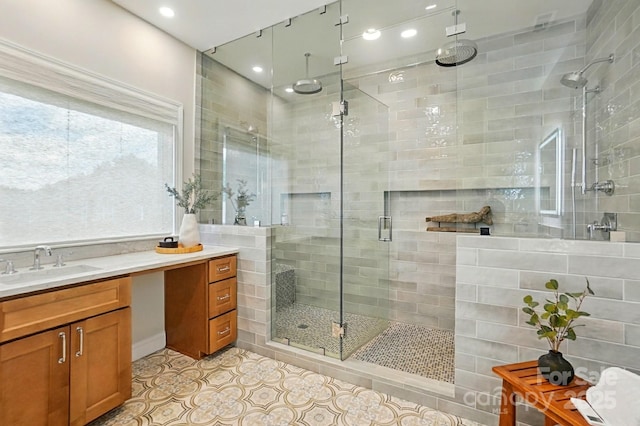 7903 Tottenham Ct, Waxhaw, NC 28173 - full bath featuring a stall shower, vanity, tile patterned floors, and recessed lighting
