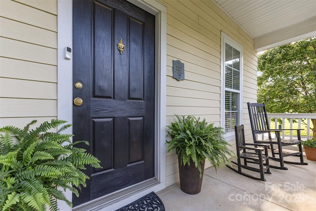 7344 Gilead Rd, Huntersville, NC 28078 - view of exterior entry featuring covered porch